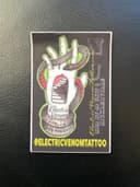 Electric Venom Tattoo Parlor logo