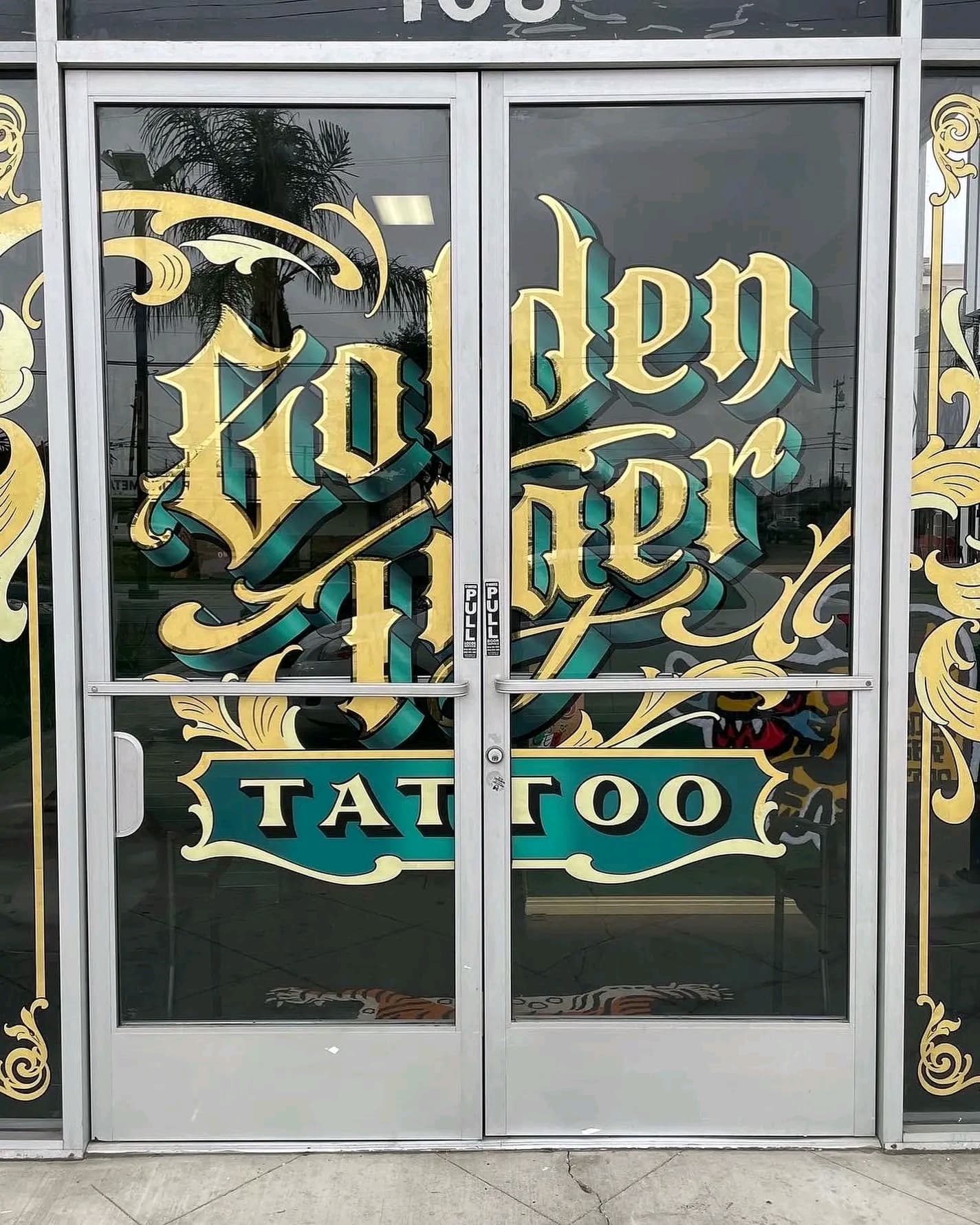 Golden Hand Tattoo